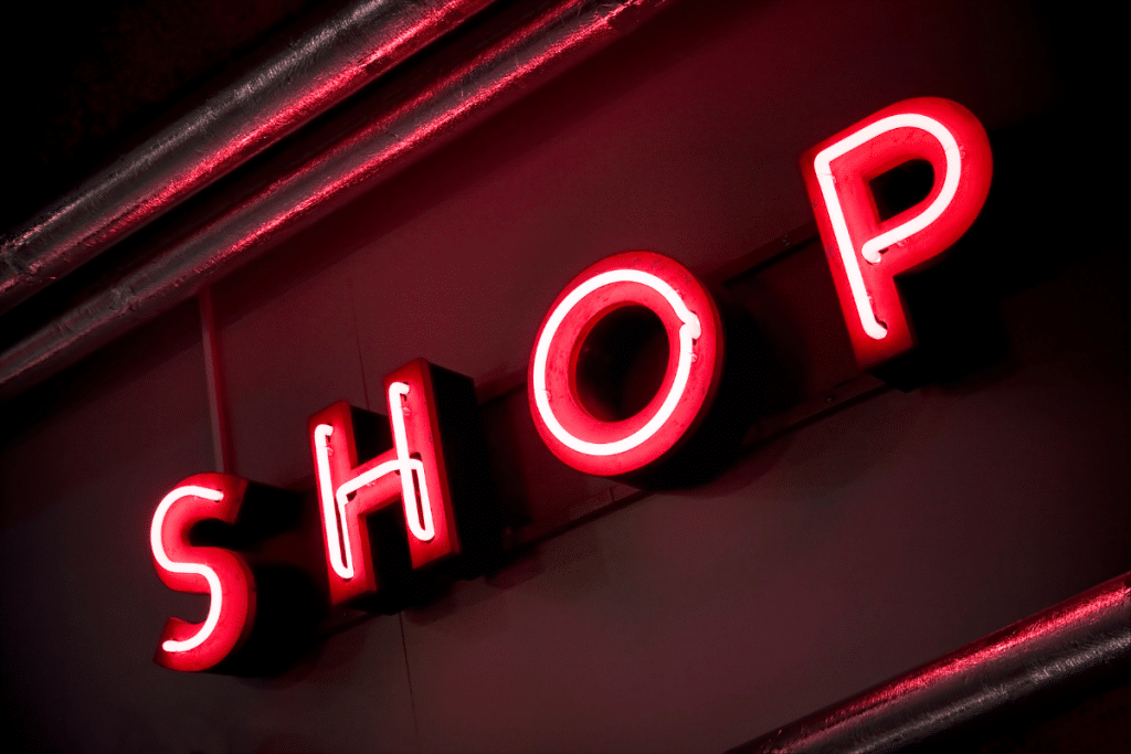 An LED sign displaying the word 'Shop' purchased at sign shop Birmingham: The Sign Supermarket